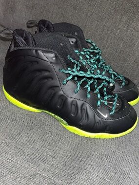 Nike Kids Black Sneakers with Teal Laces and Neon Yellow Soles